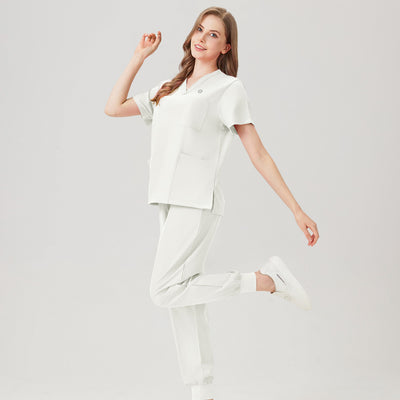 Uniforme de trabajo blanco de mujer, vista lateral