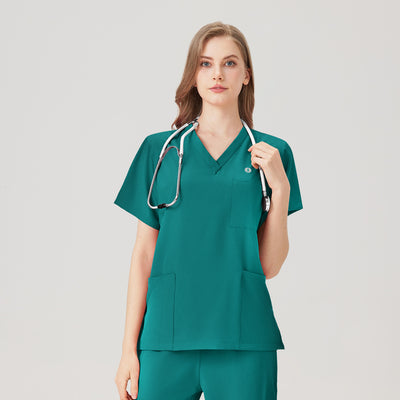 Uniforme médico femenino verde esmeralda, exhibición superior
