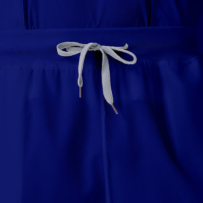 Bata quirúrgica azul rey JelriSoFit® para hombre, vista frontal del pantalón