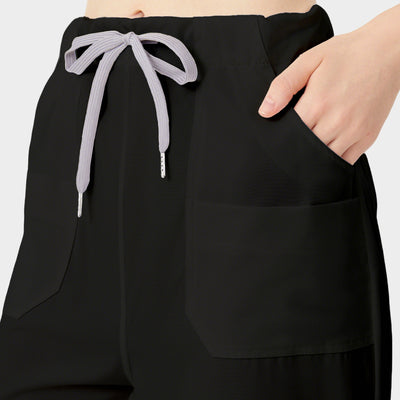 Uniforme médico de mujer, detalles de pantalón negro