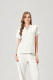 Uniforme médico quirúrgico, color blanco crema para mujer, vista frontal
