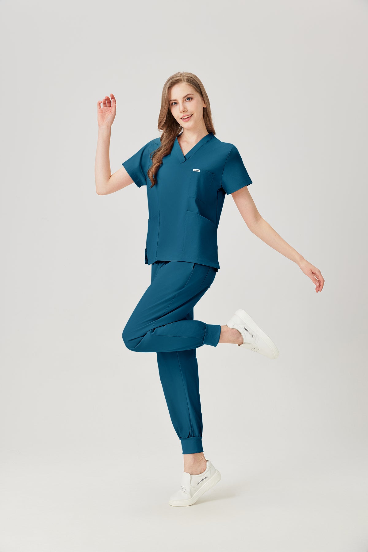 Bata quirúrgica JelriSoFit® azul cielo para mujer, vista lateral