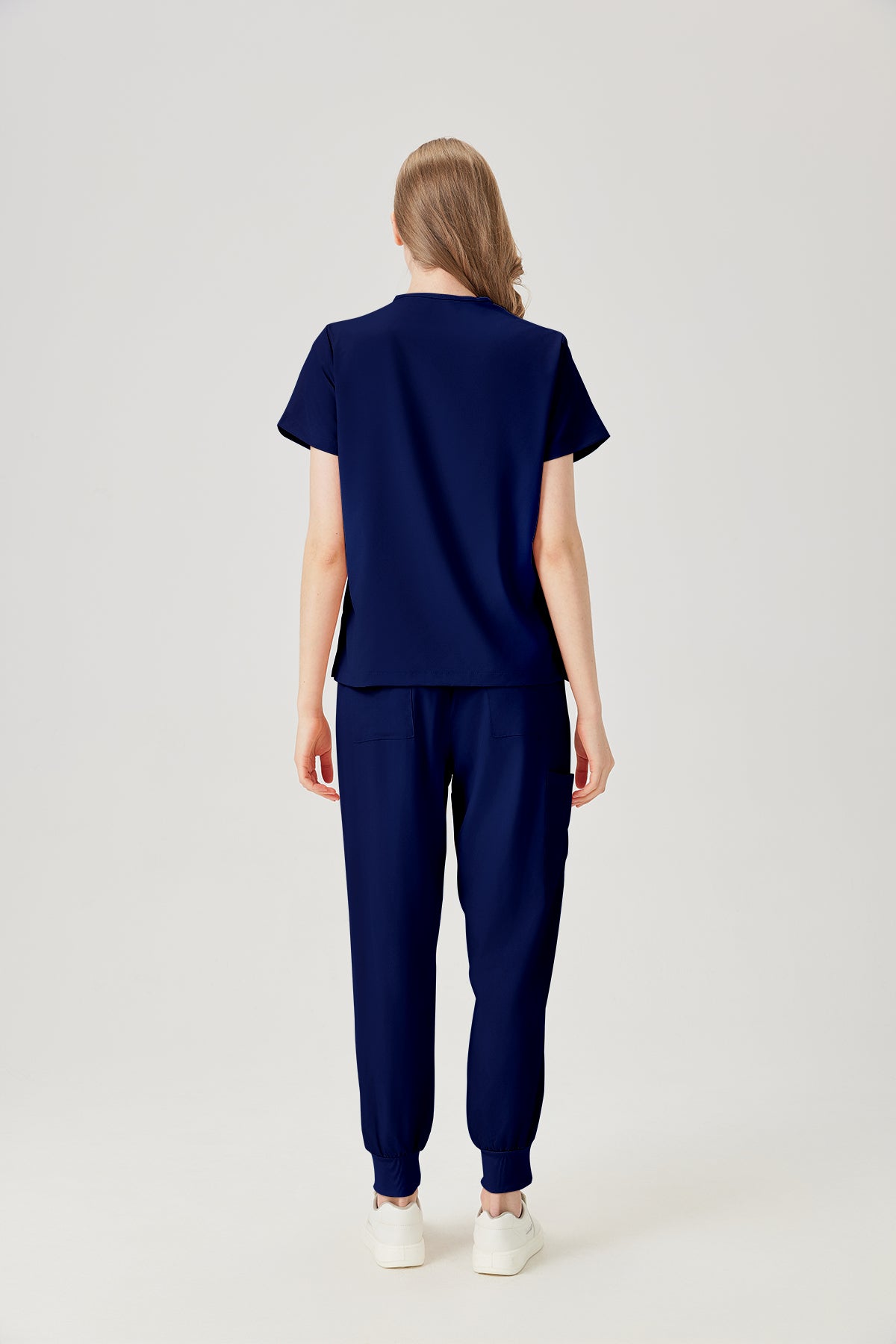 Bata quirúrgica azul marino para mujer, vista posterior