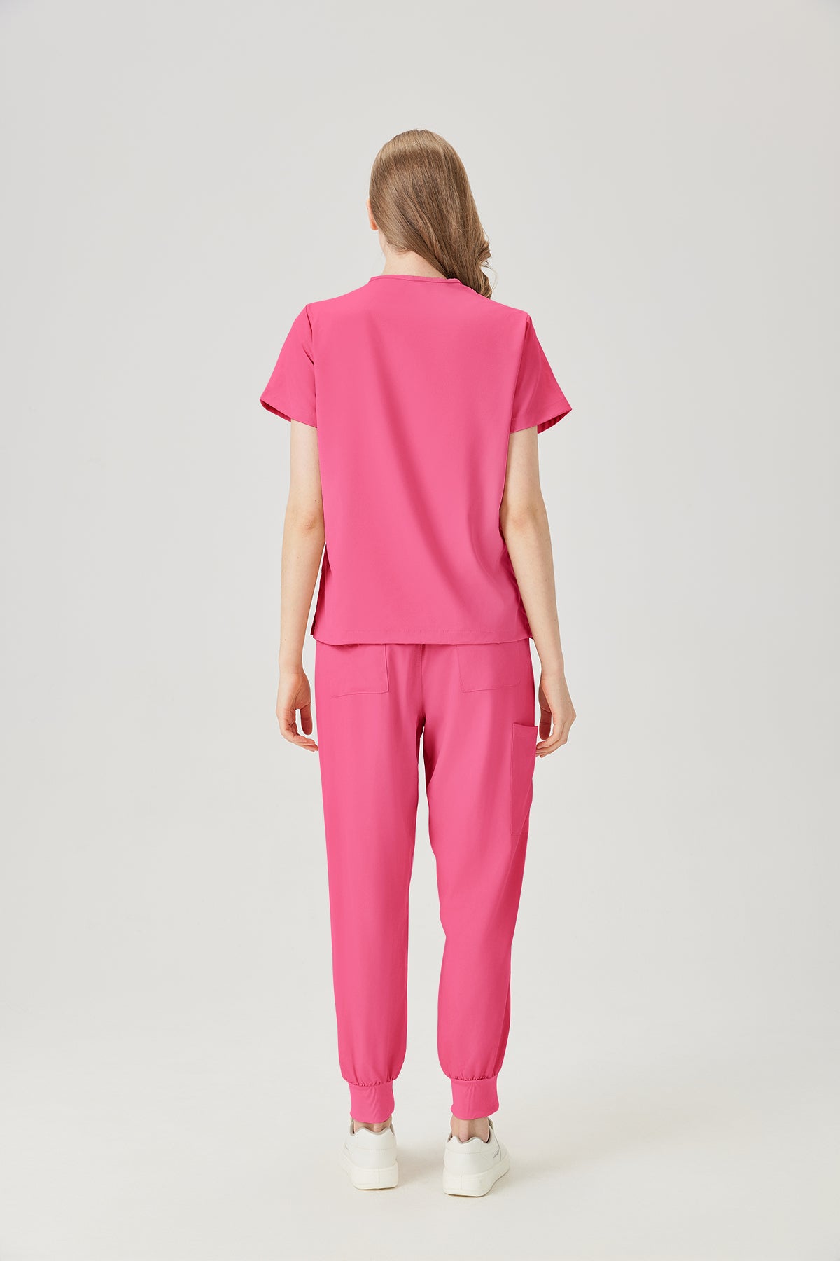 Bata quirúrgica fucsia para mujer JelriSoFit® (vista posterior)