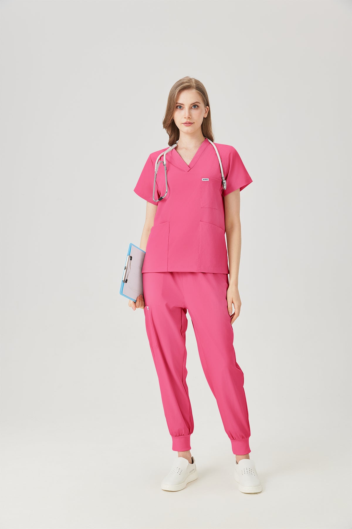 Exhibición de modelos de bata quirúrgica fucsia para mujer JelriSoFit®