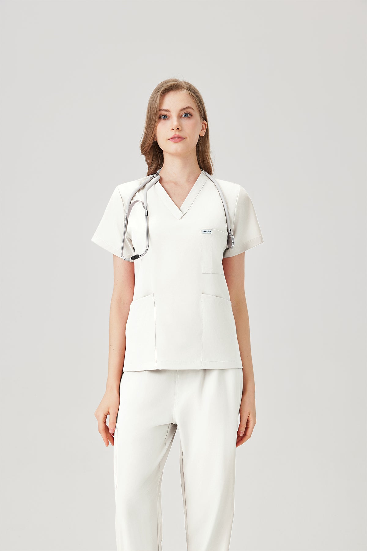 Uniforme médico quirúrgico blanco para mujer