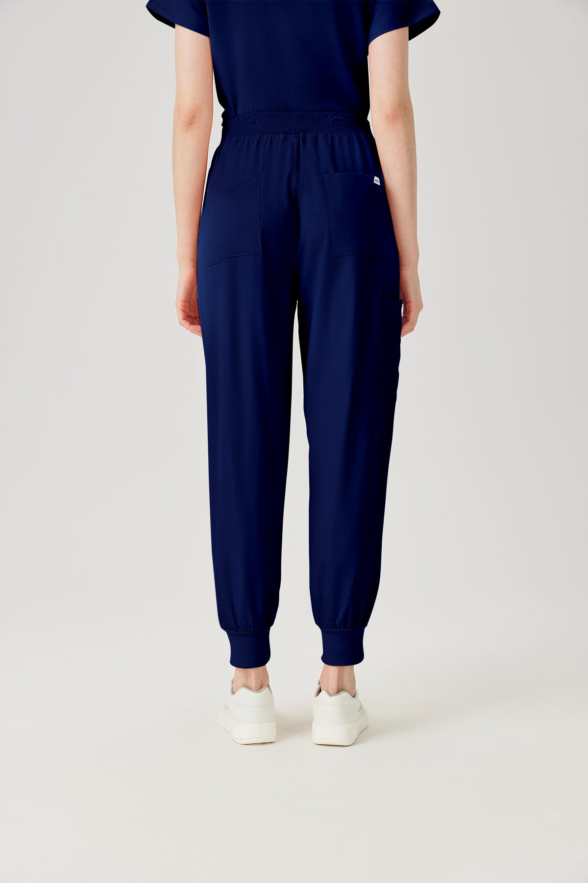 Bata quirúrgica azul marino para mujer, pantalón, vista posterior