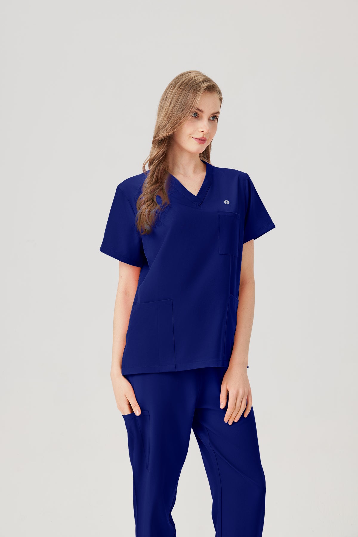 Uniforme médico de mujer azul real, vista frontal