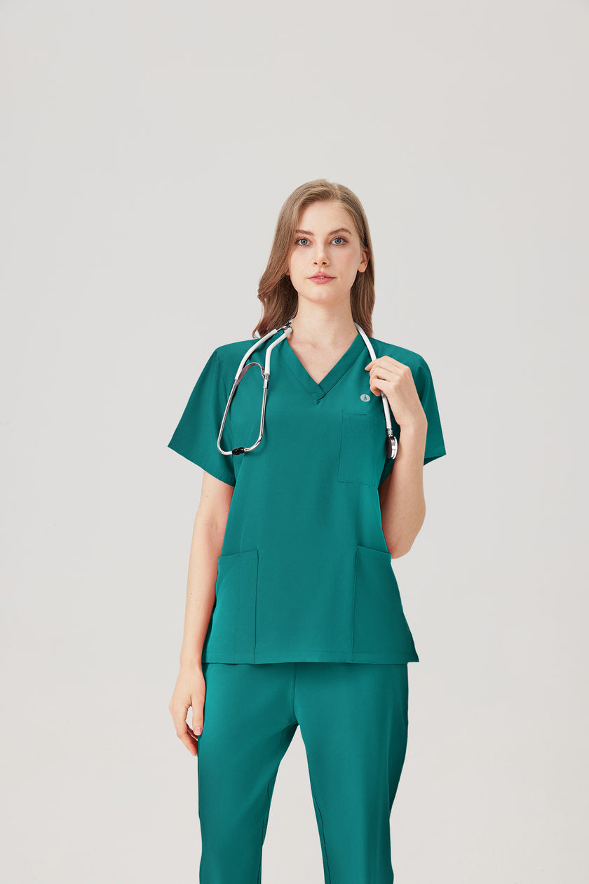 Uniforme médico femenino verde esmeralda, exhibición superior