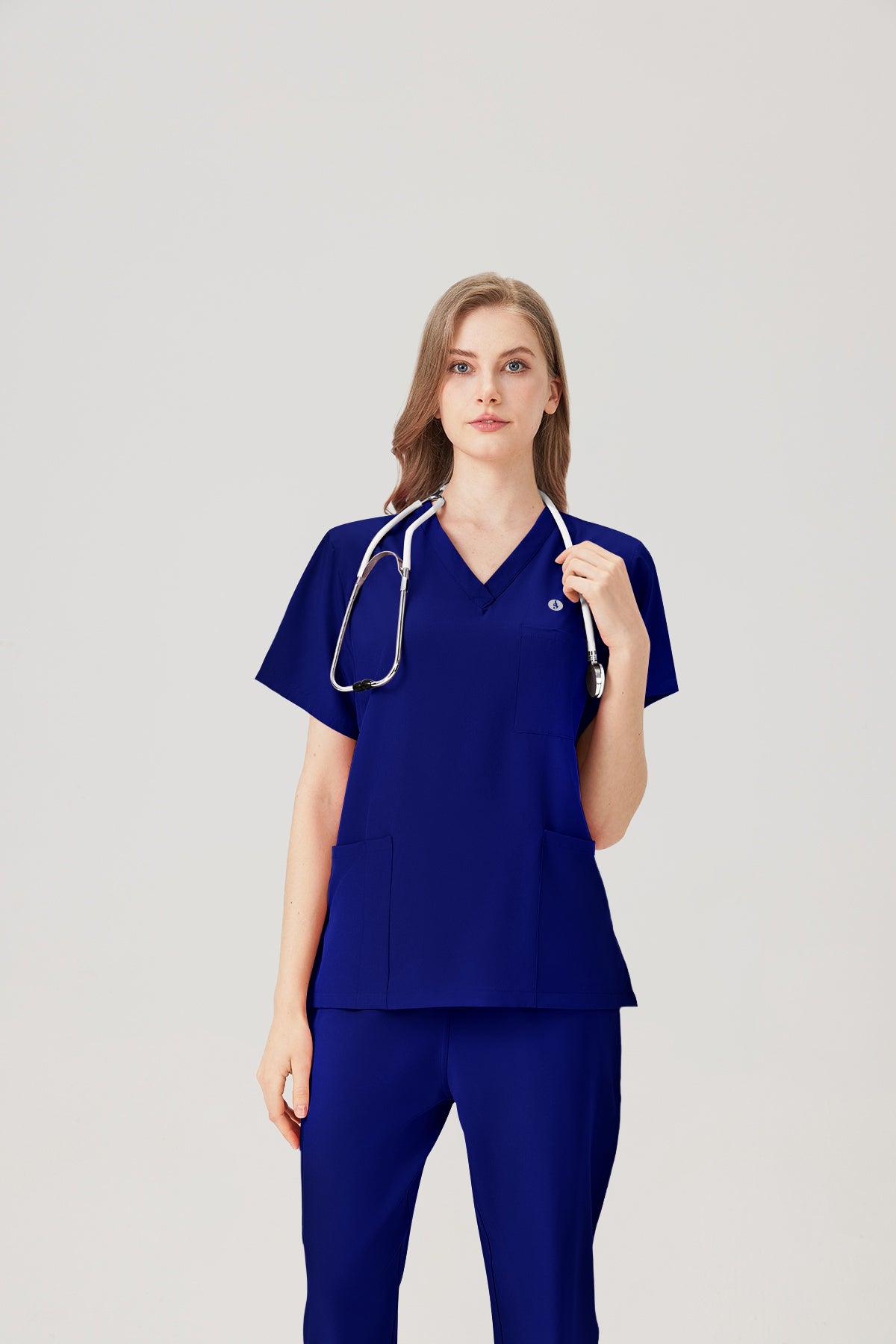 Uniforme médico de mujer azul real, efecto de exhibición de la parte superior del cuerpo.