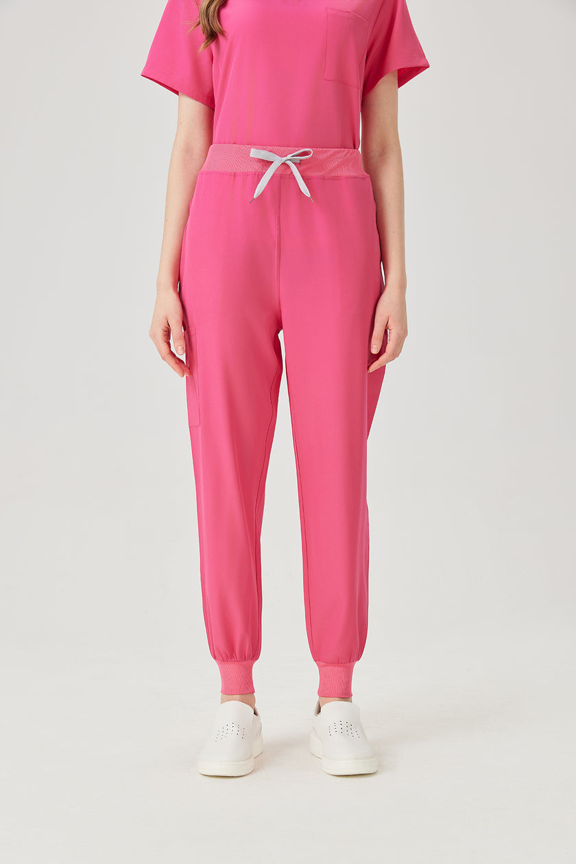 Uniforme médico morado para mujer, vista frontal de los pantalones.