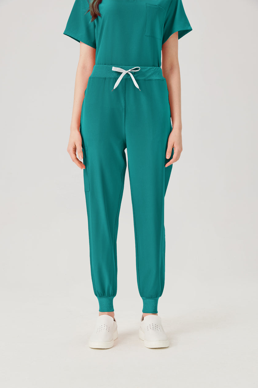 Uniforme médico de mujer verde esmeralda, vista frontal del pantalón
