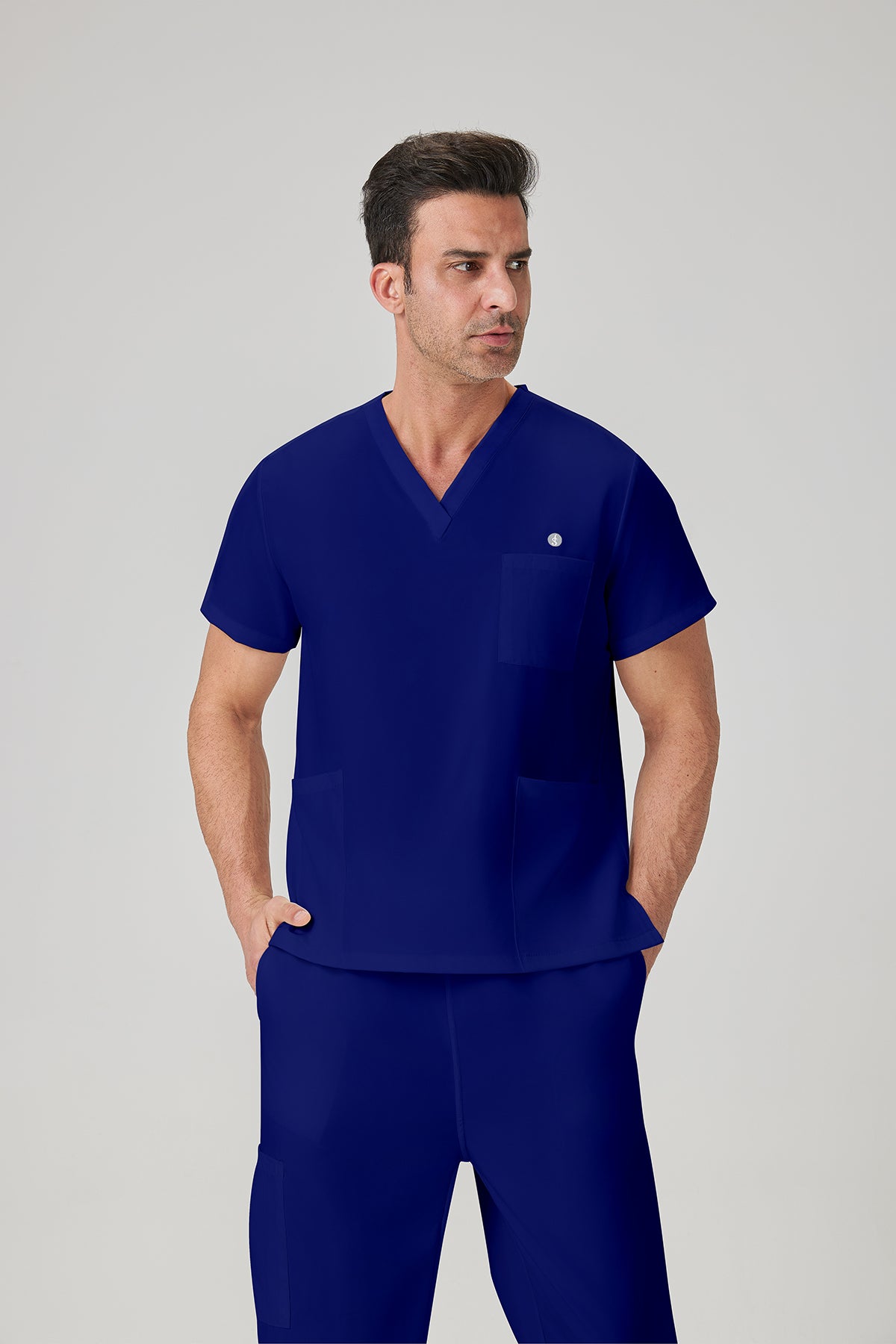 Uniforme médico JelriSoFit® azul real para hombre, vista frontal