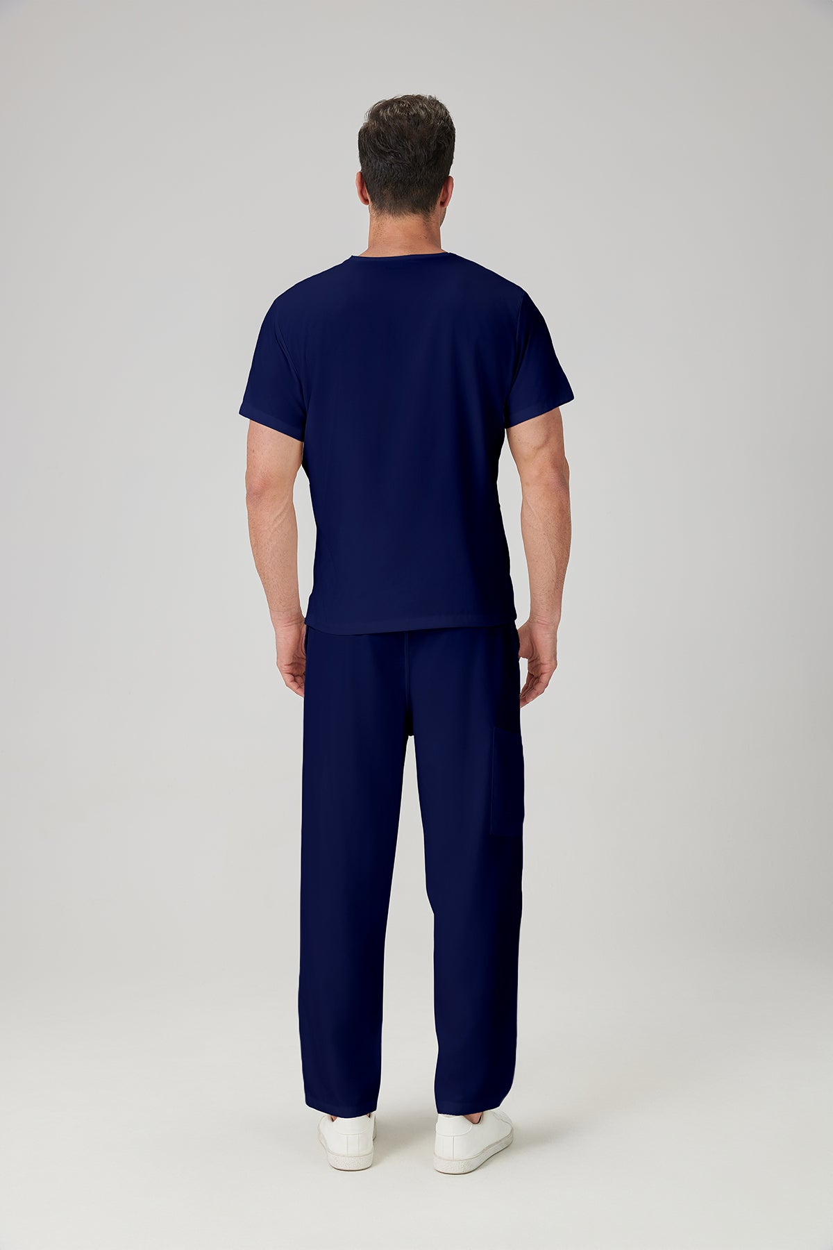 Bata quirúrgica azul marino JelriSoFit® para hombre (vista posterior)