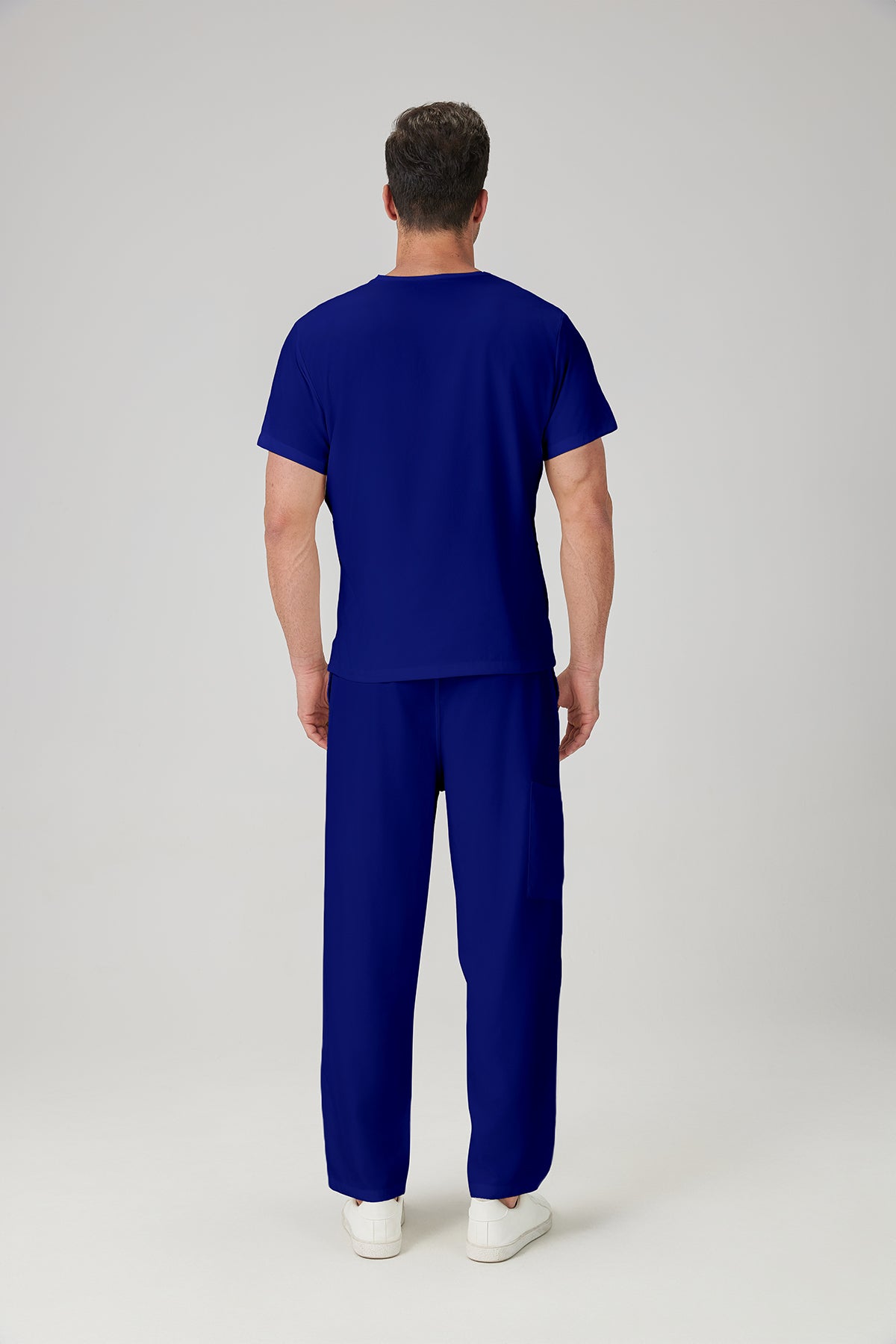 Bata quirúrgica JelriSoFit® azul real para hombre, vista posterior