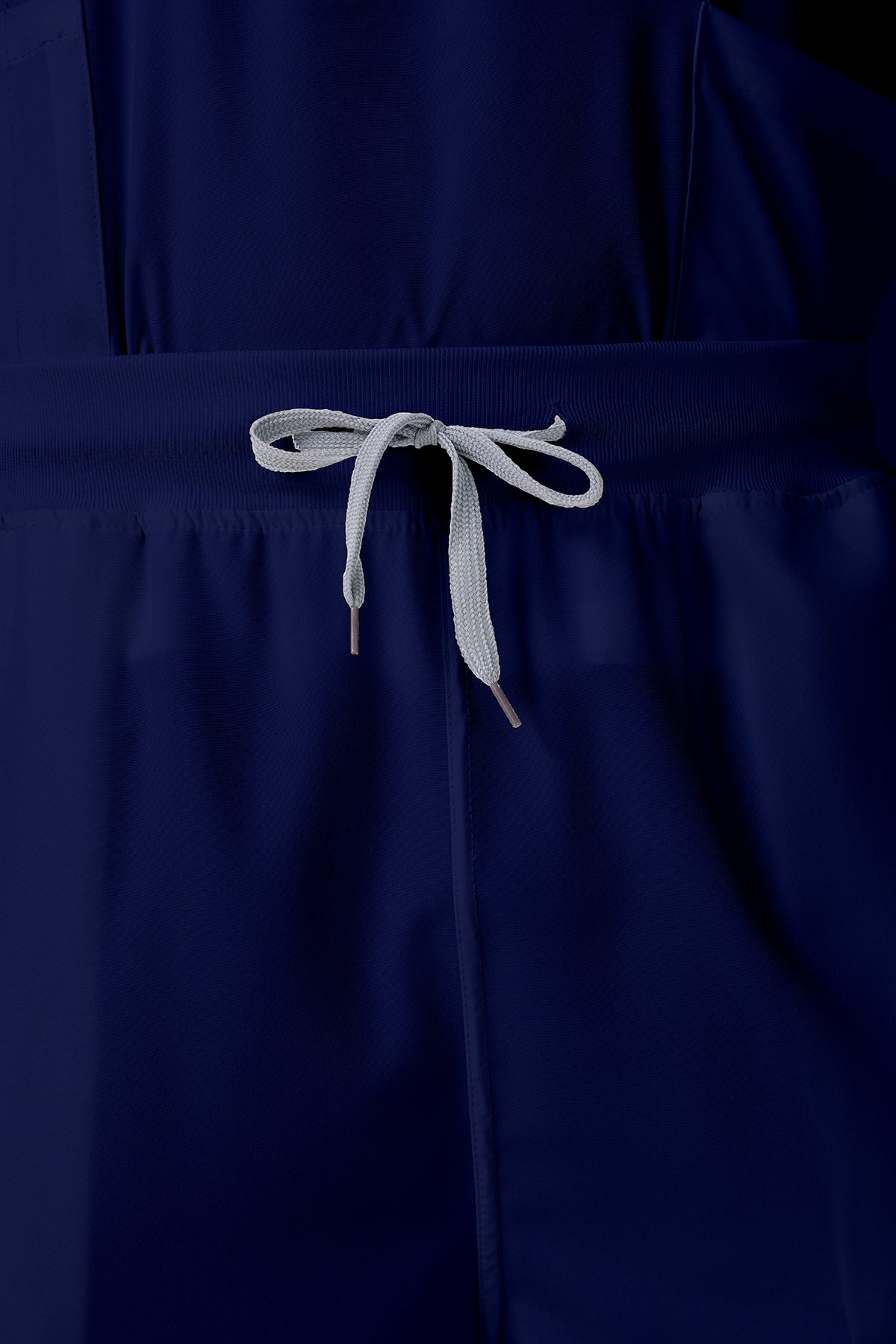 Bata quirúrgica azul marino para hombre JelriSoFit®, vista frontal del pantalón