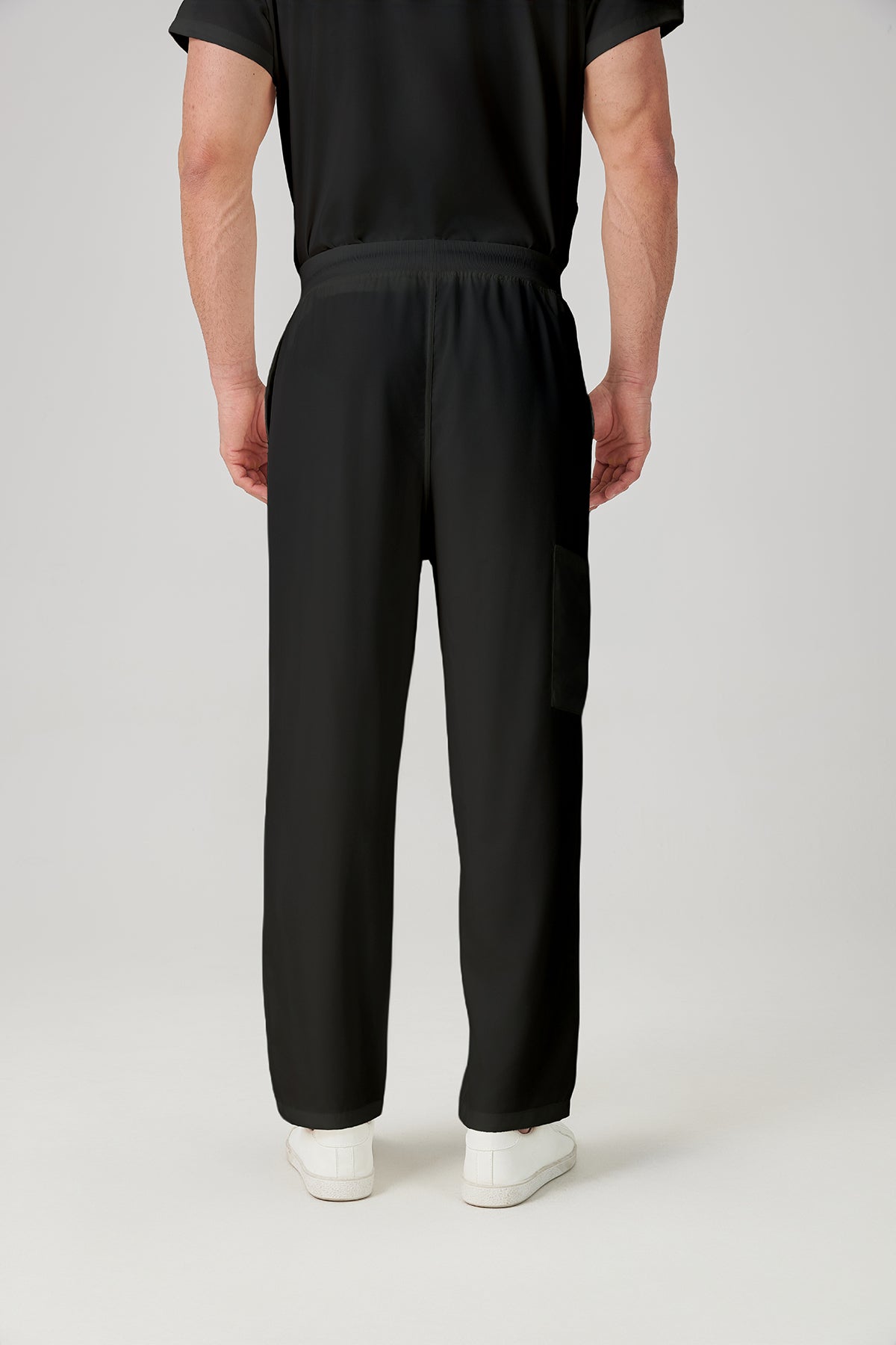 Bata quirúrgica negra para hombre JelriSoFit®, parte trasera del pantalón