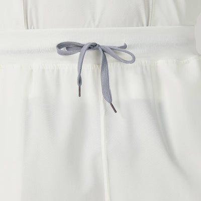 Bata quirúrgica JelriSoFit® para hombre - Crema, vista frontal del pantalón
