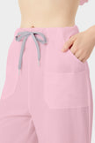 Bata quirúrgica rosa de mujer, vista lateral de los pantalones