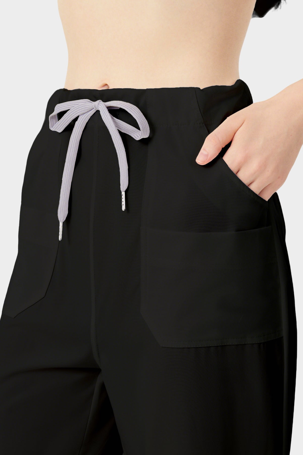 Uniforme médico de mujer, detalles de pantalón negro