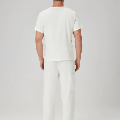 Bata quirúrgica para hombre JelriSoFit® - Crema, modelo mostrado de espaldas
