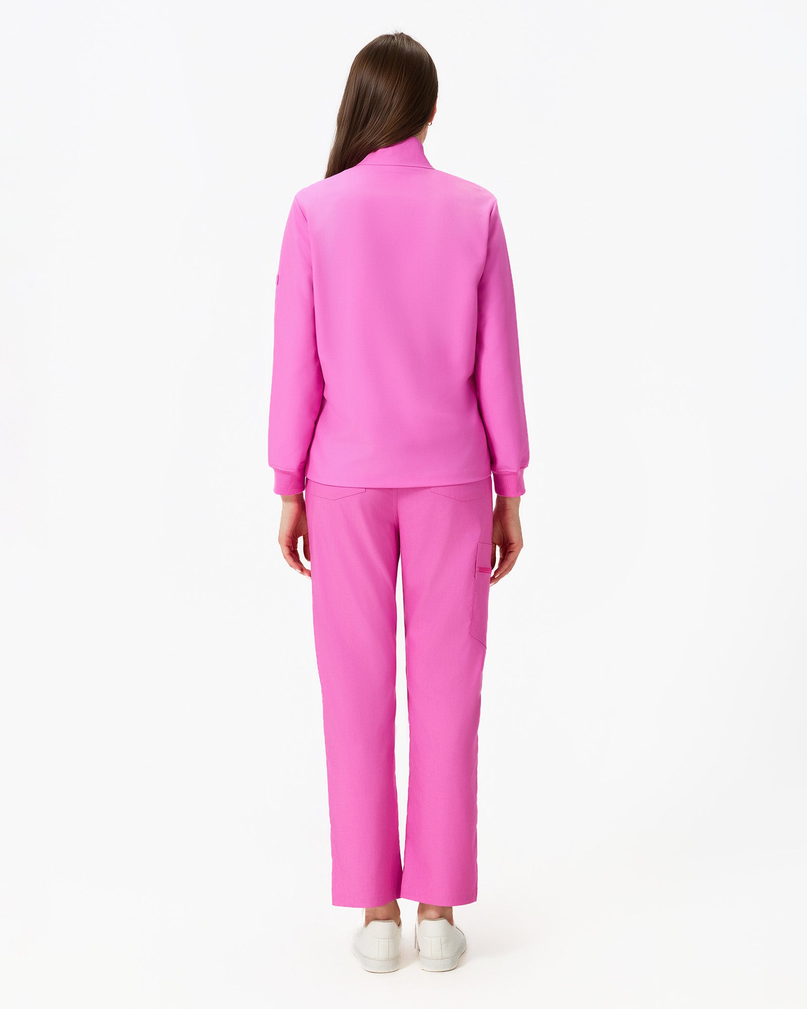 Vista trasera uniforme de trabajo rosa baya