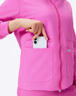 Bolsillo delantero de chaqueta rosa baya para teléfono
