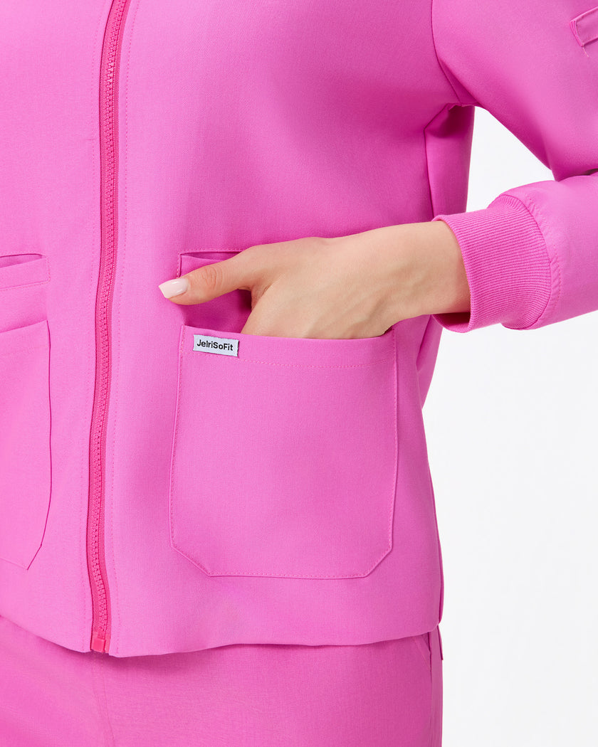 Bolsillo con etiqueta JelriSoFit de chaqueta rosa baya