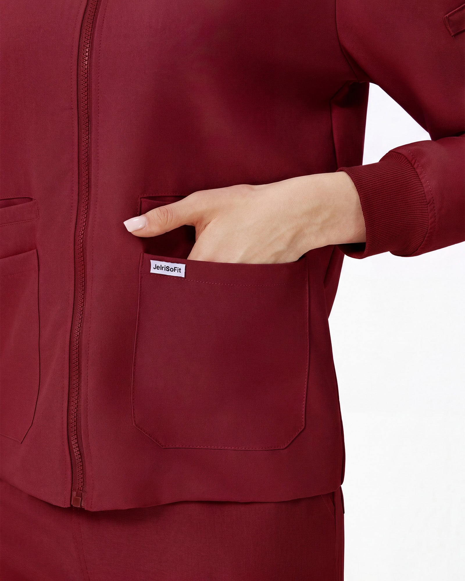 Bolsillo con etiqueta JelriSoFit de chaqueta vino